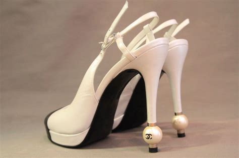 chanel white pearl heels|Chanel boots with pearl heel.